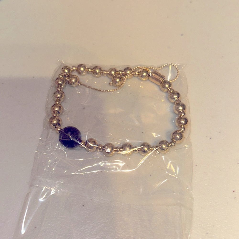 Energy bead pull bracelet amethyst- Avon